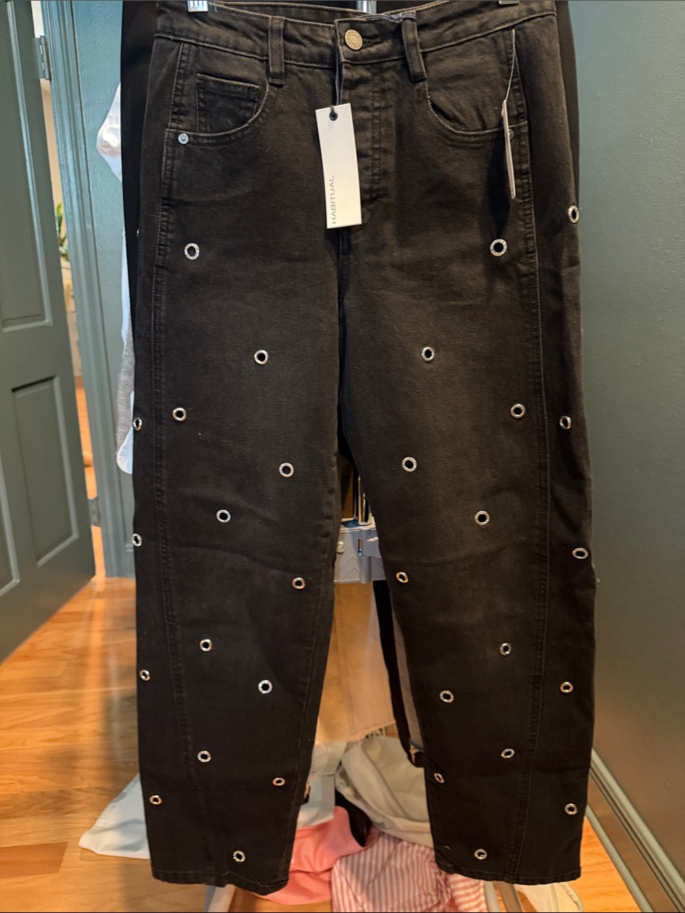 Women’s black jeans w grommets